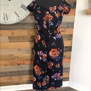 Black floral button up romper